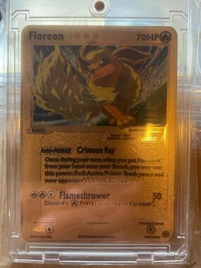 Pokemon Flareon Gold Foil Card with Orange & Yellow Artwork real Metal